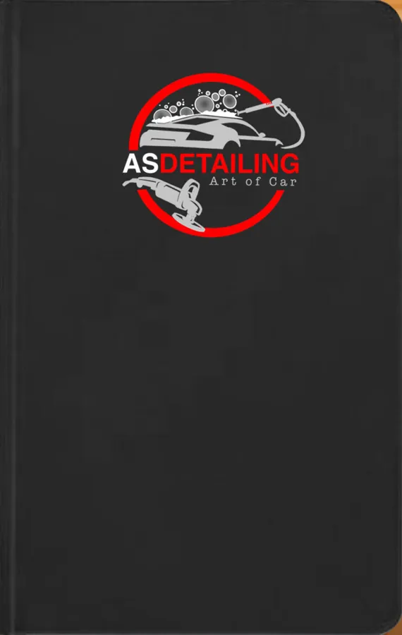 The AS Detailing badge on the cover of a black-bound notebook