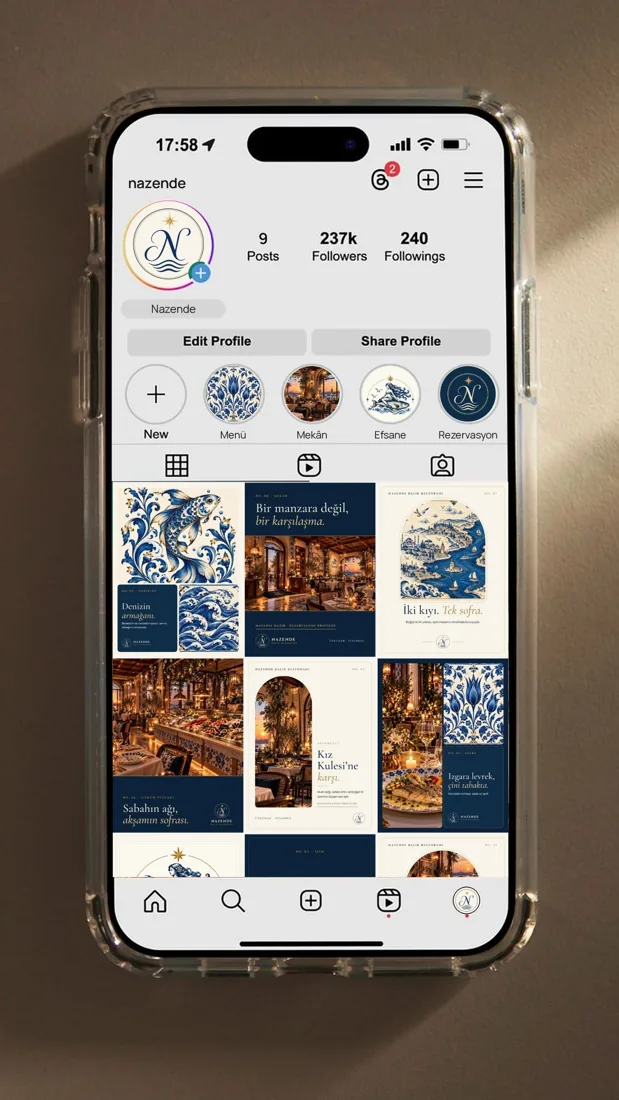 Nazende Instagram profile on a phone screen with the monogram avatar, highlights and a nine-post grid